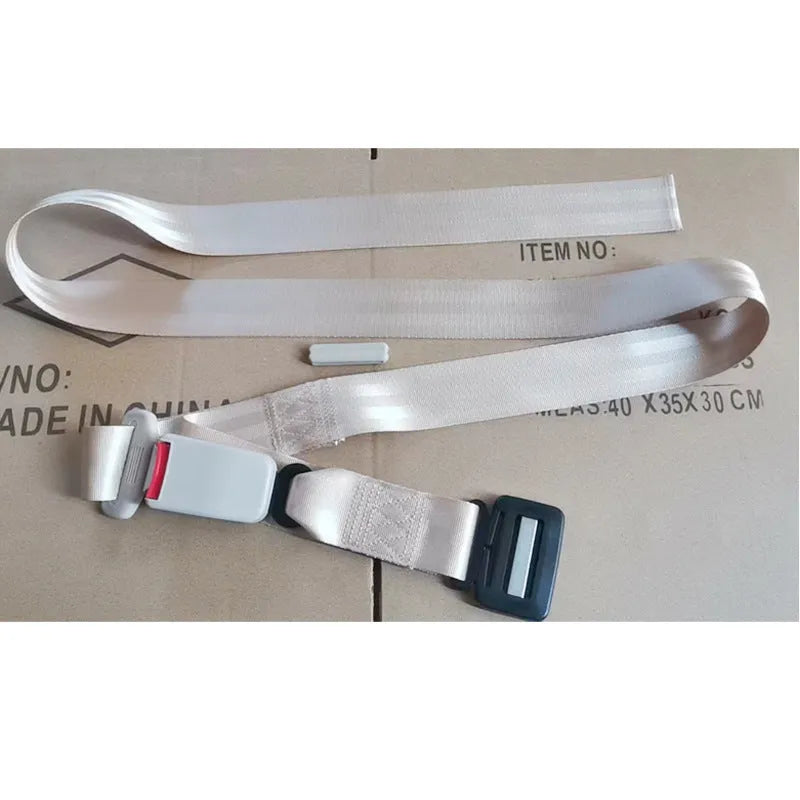 Adjustable black maternity car seat belt extension shown wrapped around a car seat.