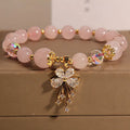 Amethyst crystal beaded bracelet with butterfly charms in mori normcore style