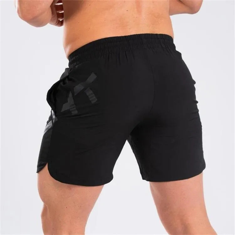 Men's elastic quick-drying nylon sports shorts in black colour for summer training activities