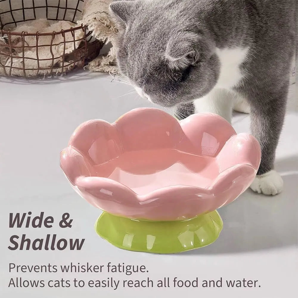 Pink ceramic raised cat bowl with flower shape and non-slip base, 15-degree angle, for small to medium cats