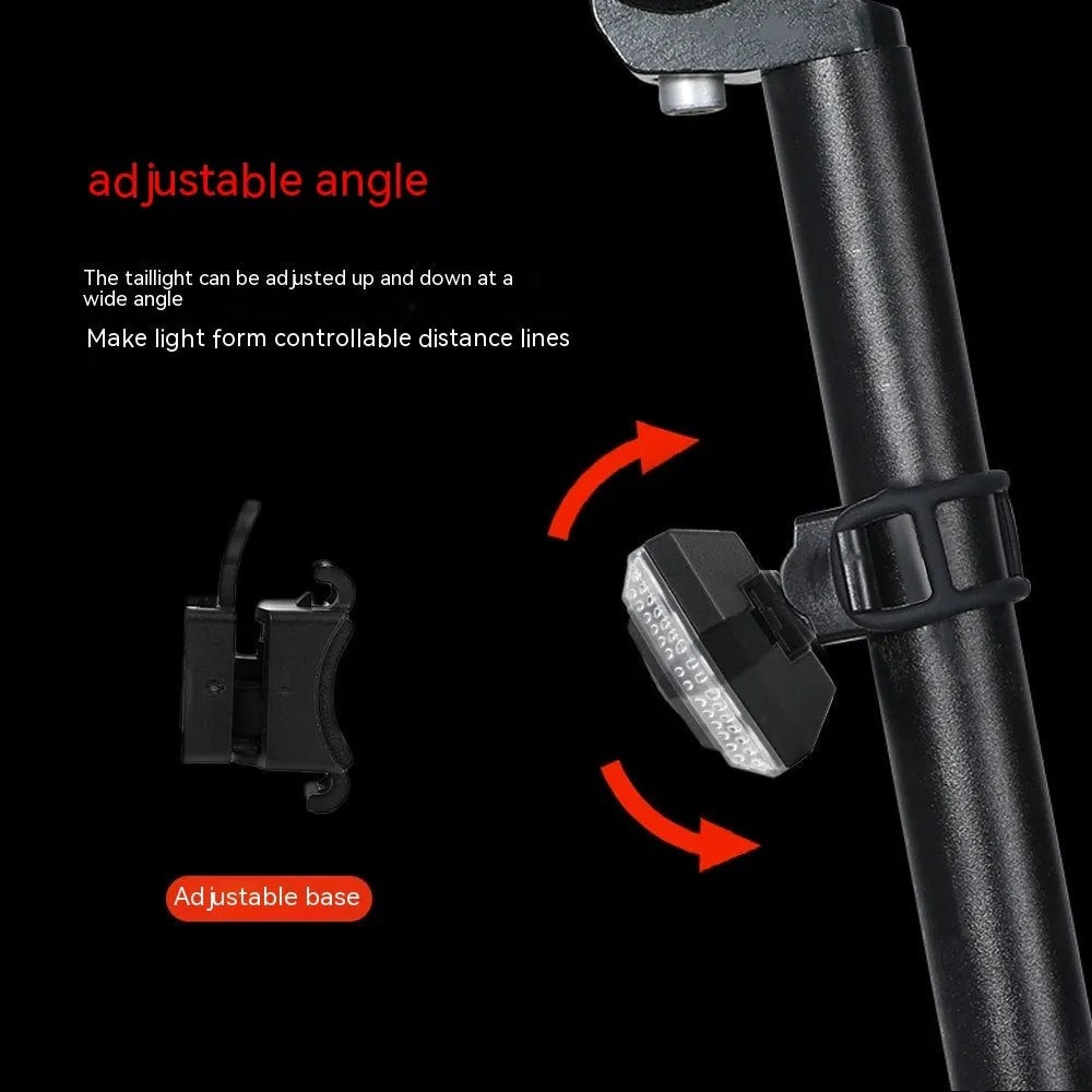 Black wireless remote control motorcycle turn signal taillight with USB charging port.