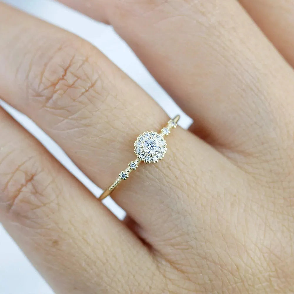 925 silver women's ring with gold electroplated finish, flower rhinestone detailing and geometric shape