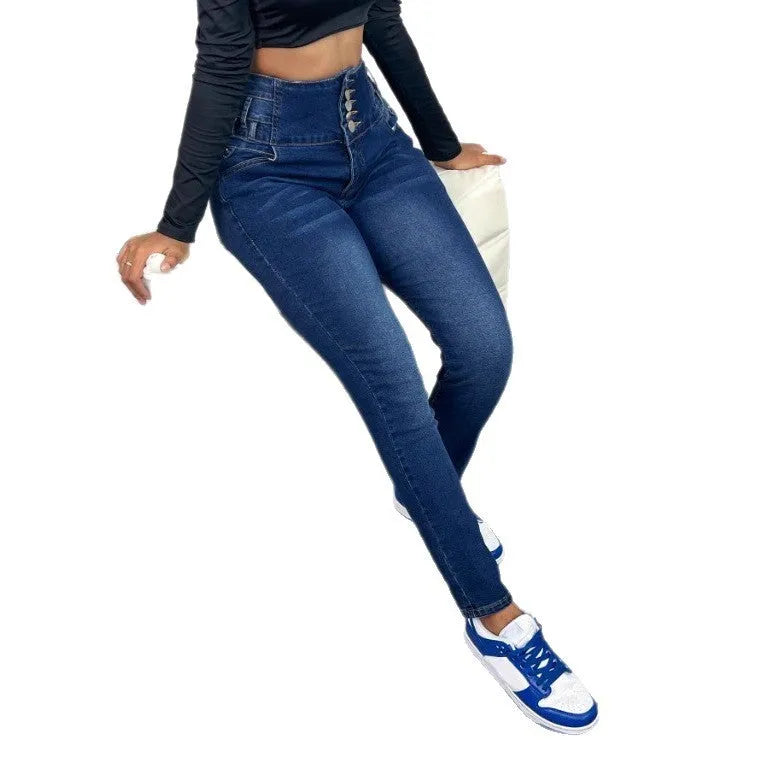 Dark blue women's straight-leg denim trousers with button and zipper details on a hanger.