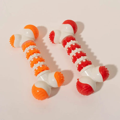 Blue, orange, and red bone-shaped interactive dog chew toy with textured ends and treat compartment.