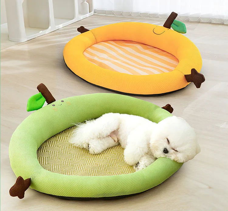 Green fruit-shaped pet nest mat with raised backrest for a cat or small dog.