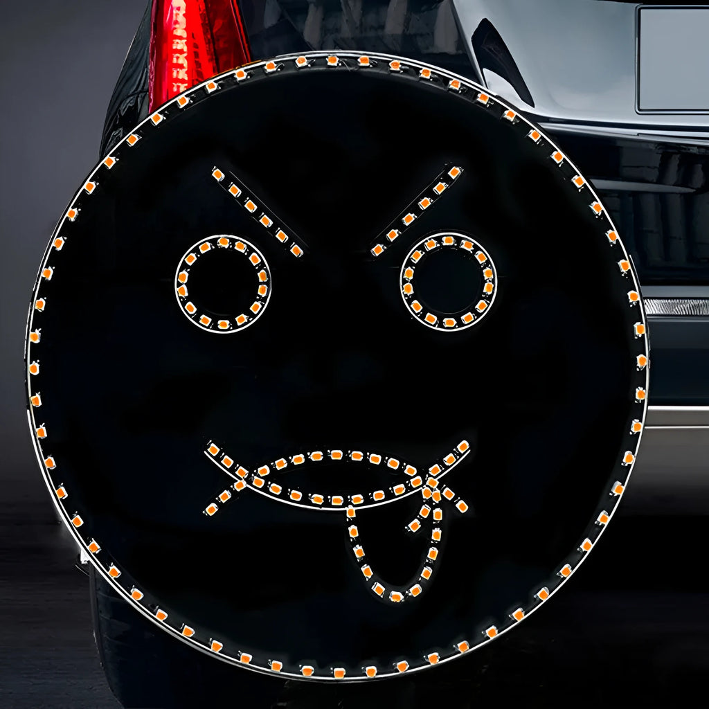 Black car rear window LED expression light showing smiley face design with orange illumination