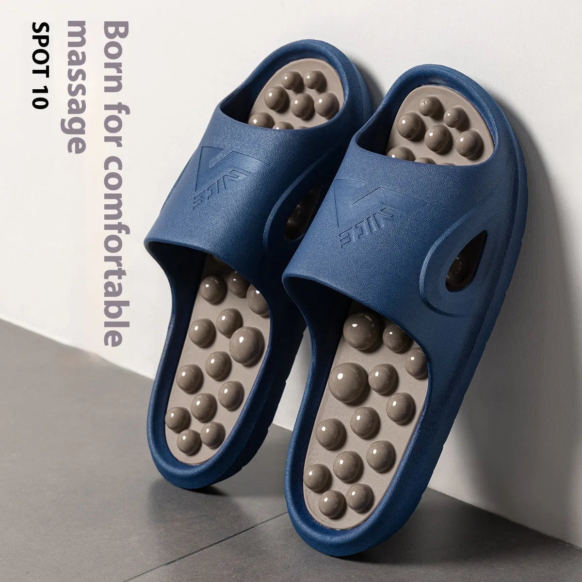 Ball massage sandals in purple, non-slip PVC with grape-particle studs, side view