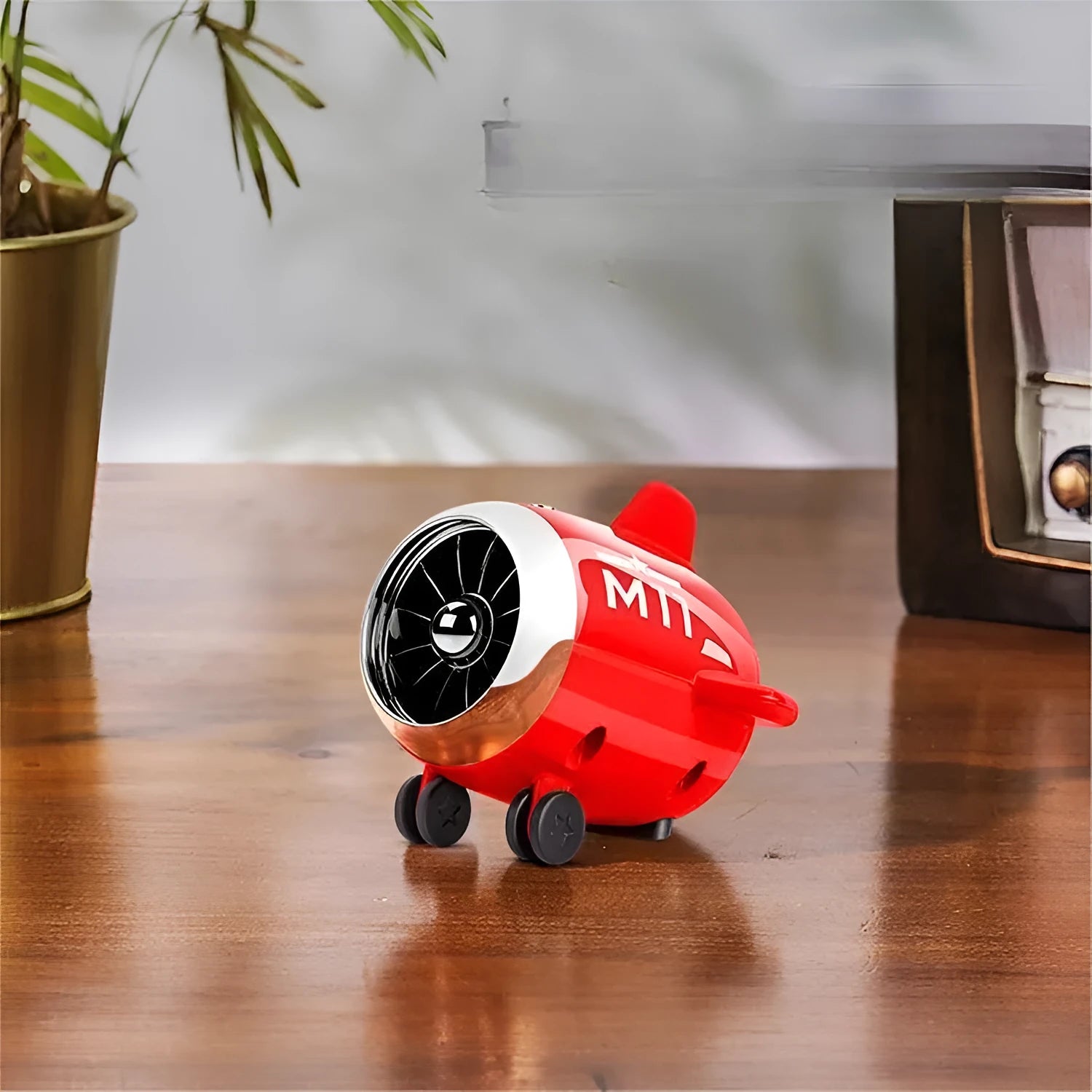 Mini wireless Bluetooth speaker in various colours showing compact 85mm × 75mm × 70mm design