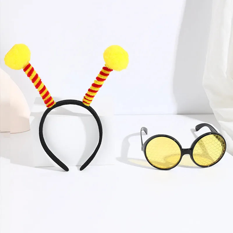Bees party costume set with black and yellow striped headband and matching glasses
