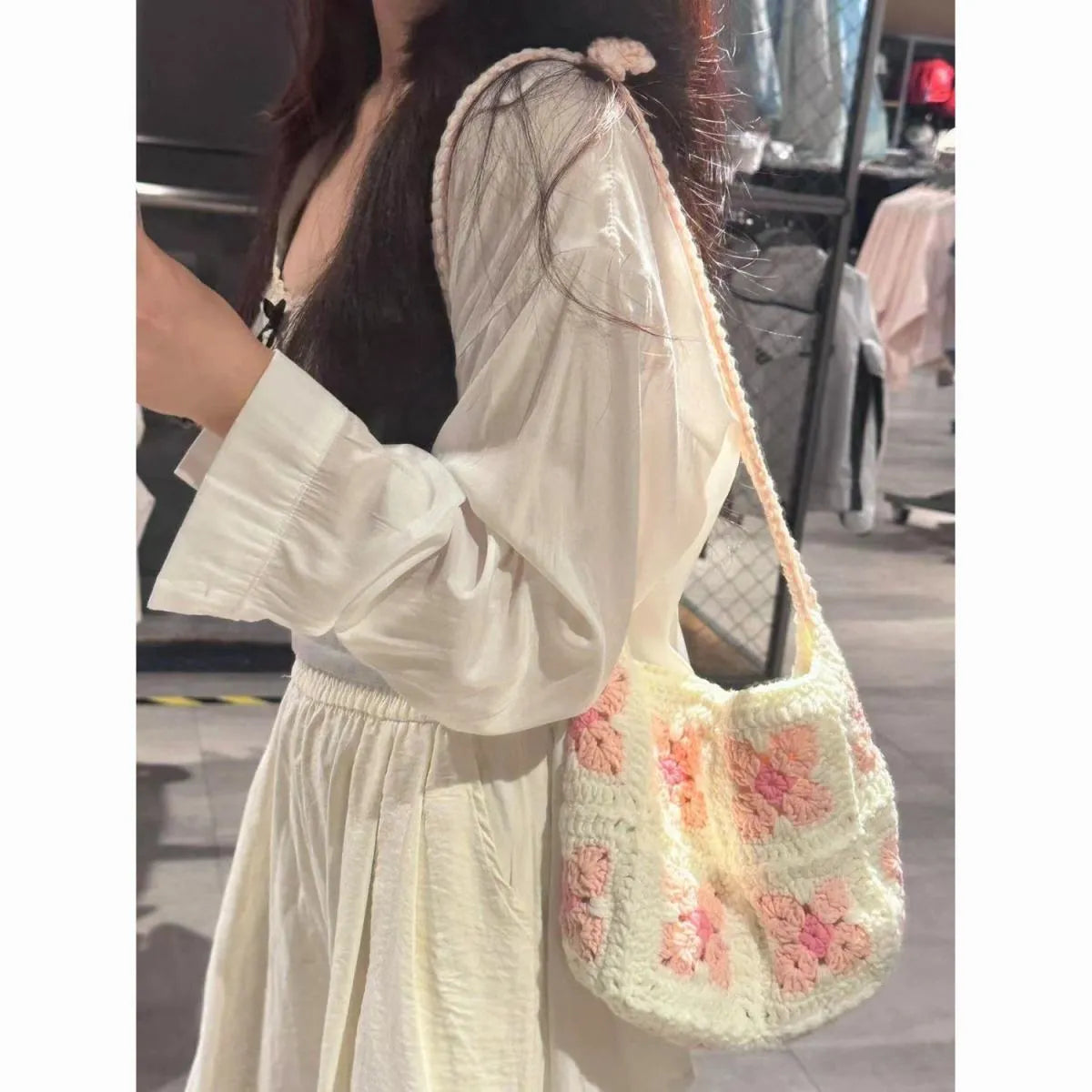 Handmade cotton crochet handbag with cherry blossom design and magnetic buckle closure