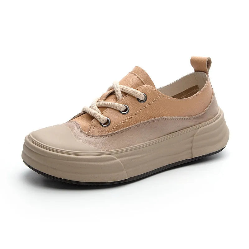 Women's matcha green leather platform sneakers with round toe and white laces on a flat sole.