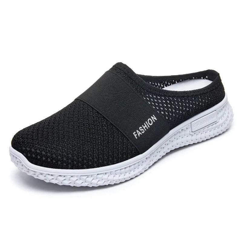 Women's breathable mesh casual shoes with flat heel and hollow-out design in black, grey, pink, or purple.
