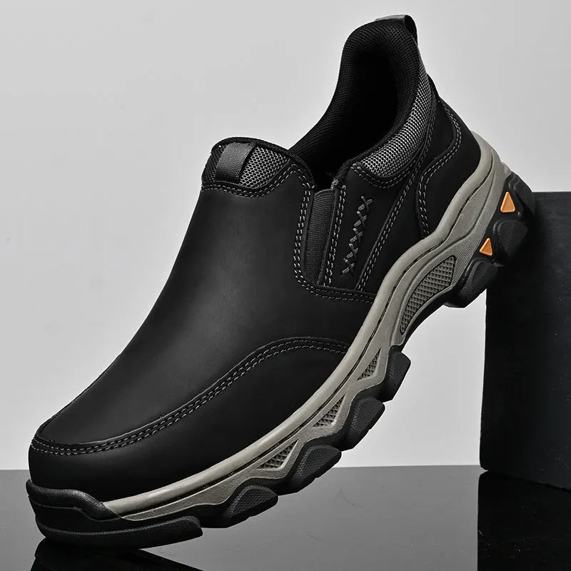 Men's dark brown casual leather shoes with a flat heel and round toe on a white background