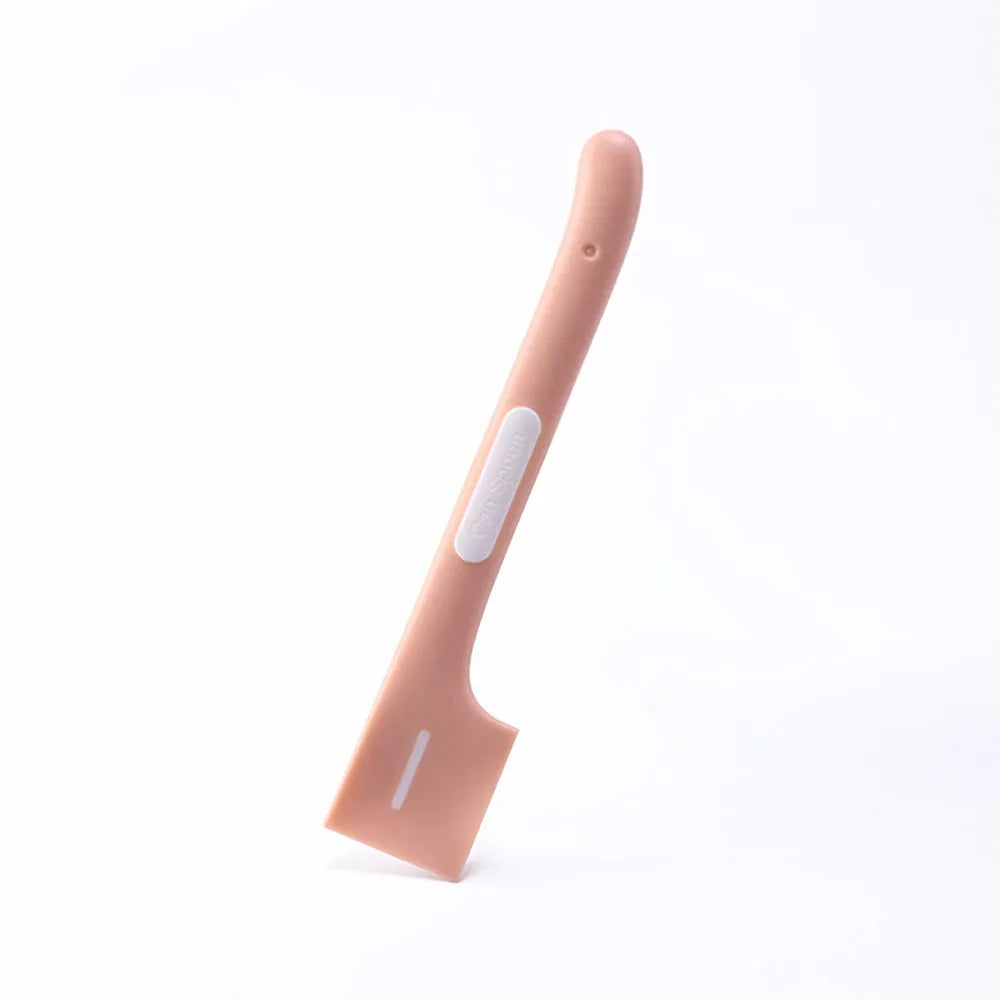 Green long-handled TPR spoon for scooping wet pet food from a tin.
