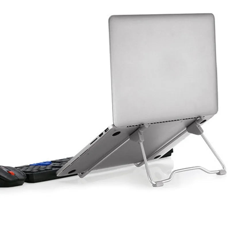 Grey aluminium alloy and engineering plastic mobile phone and laptop stand on desk