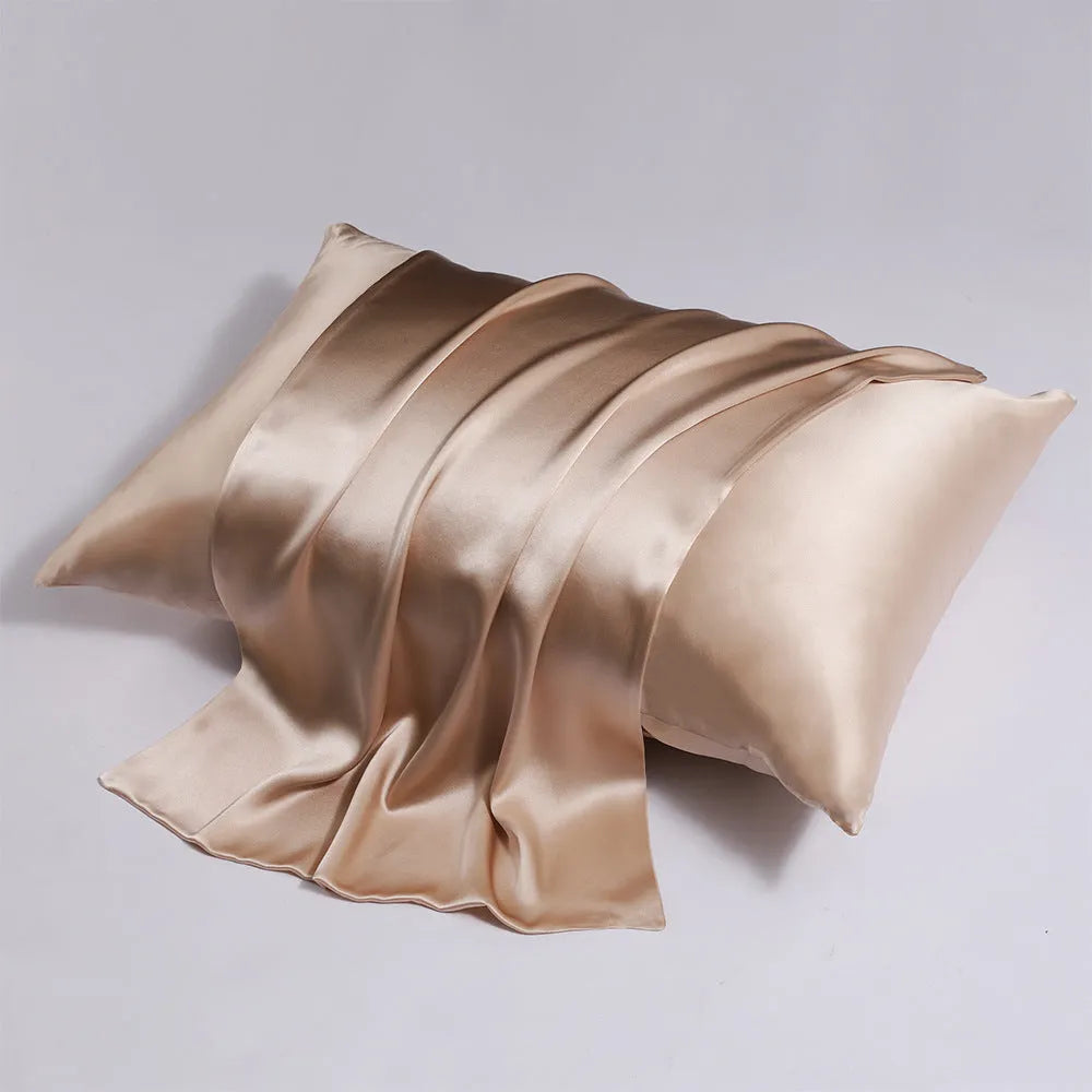 Double-sided mulberry silk pillowcase with a hidden zipper closure in a choice of thirteen colours including navy blue and light champagne.