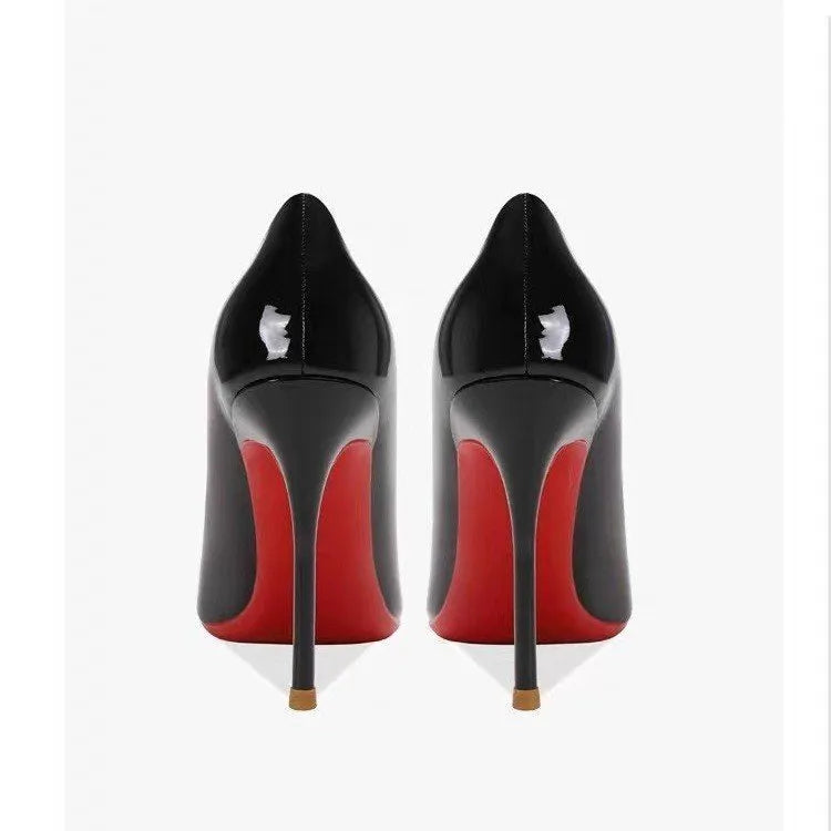 Women's pointed low-cut patent leather high heels in black with stiletto heel