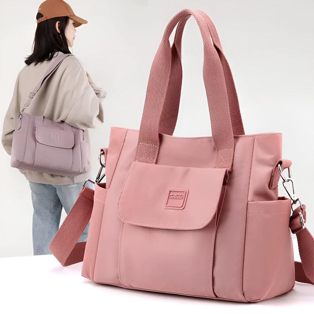 Women's large capacity multi-interlayer shoulder bag in nylon, soft horizontal square shape with sewing line detail, multiple internal compartments, urban simplicity style