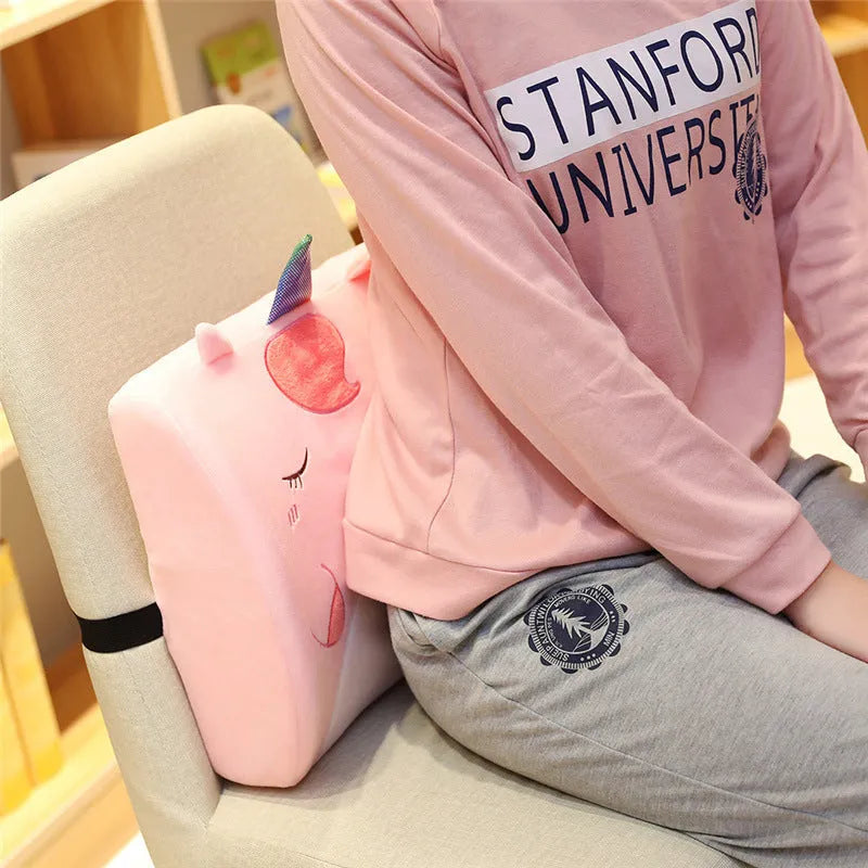 Cartoon memory foam seat cushion with removable cover, shown in Pink Unicorn design on an office chair.
