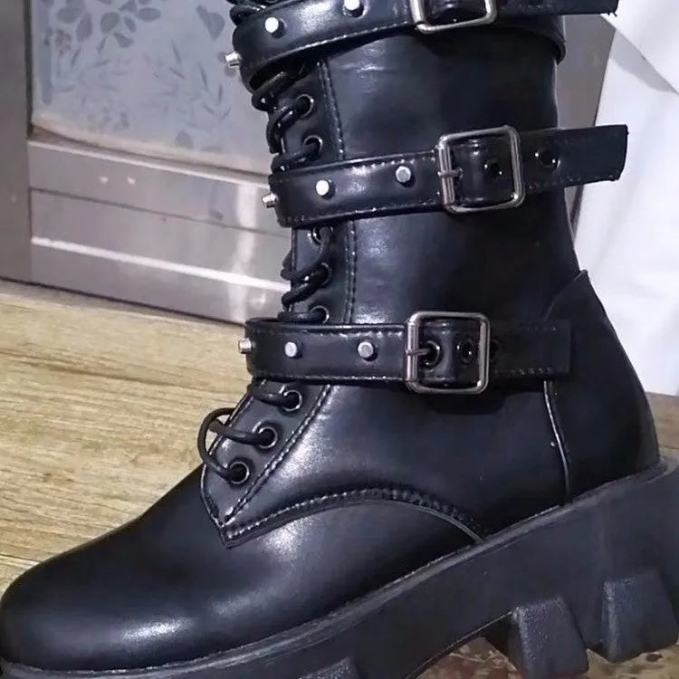 Women's black mid-calf buckle knight boots with side zipper on a white background.