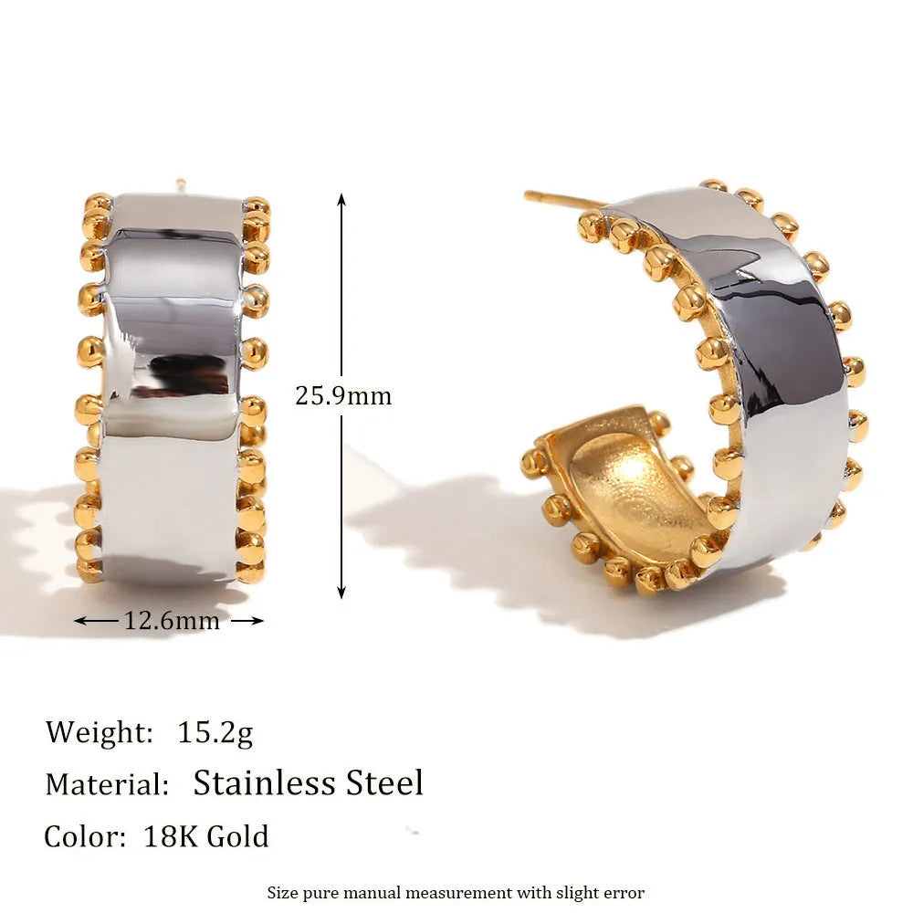 Gold geometric stainless steel jewellery set for women, showing earrings, necklace, and bracelet with electroplated finish.