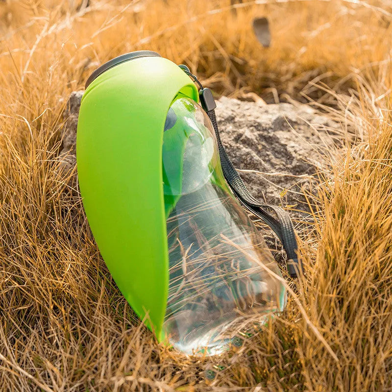 Portable pet water bottle with drinking bowl in blue, green, red, or orange colours