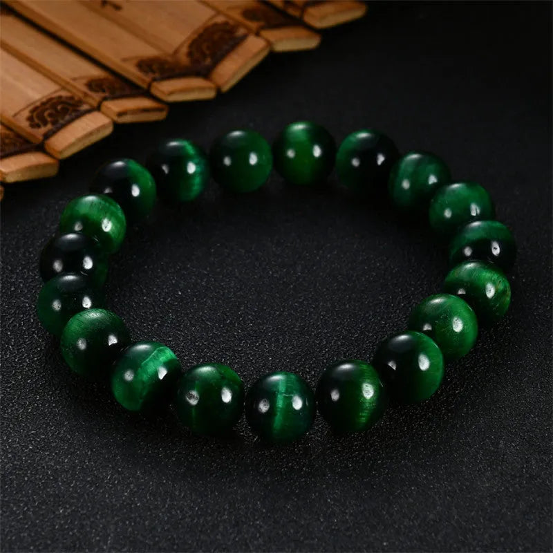 Green tiger eye stone bracelet with polished geometry beads showing five size options