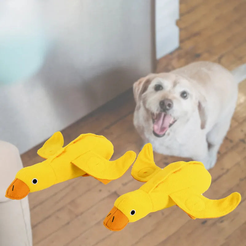 Yellow teddy duck dog toy with squeaker and treat compartment for training and dental care
