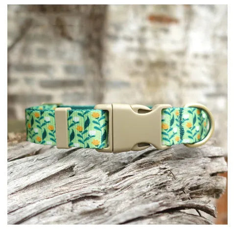 Nylon ribbon pet collar with floral pattern in Hanada blue colour, showing adjustable sizing and flower decoration