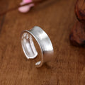 Frosted sterling silver open ring with geometric design and adjustable opening