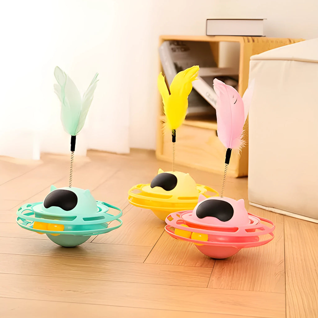 Pink cat tumbler turntable toy on a floor for feline self-play