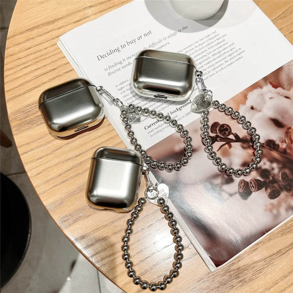 Matte plating TPU protective case for AirPods Bluetooth headsets on a plain background.