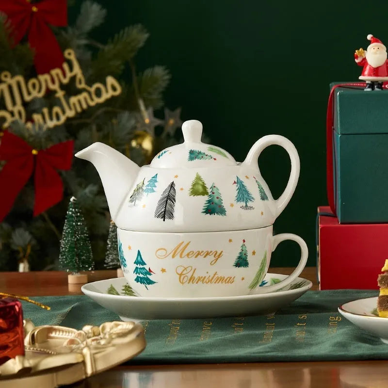 Ceramic tea set with gold-plated teapot and matching cup on dish, snowflake pattern, gift box