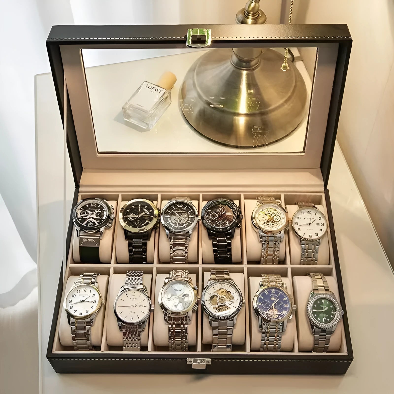 Grey high-grade leather watch storage box with a clear see-through lid, shown holding multiple watches.