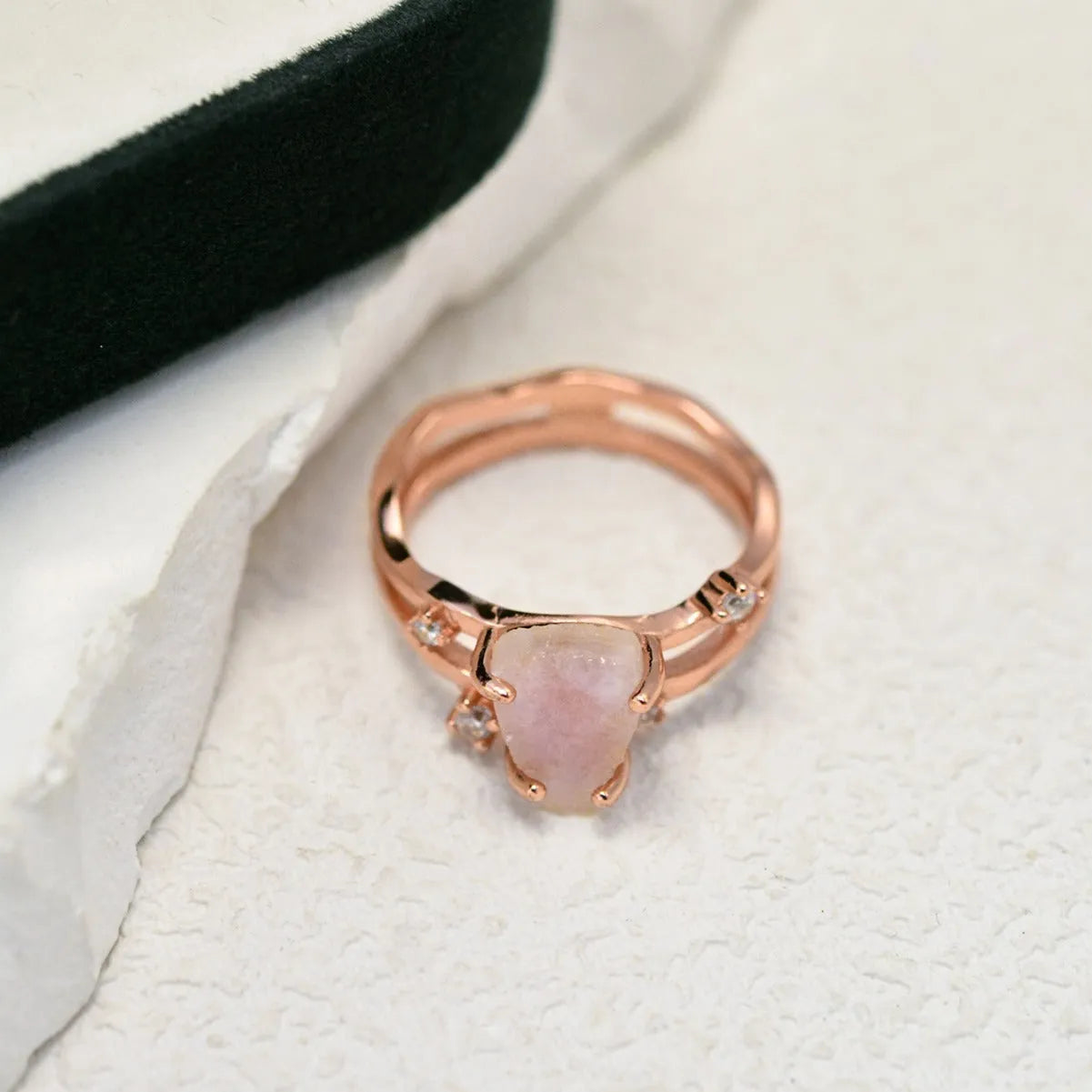 S925 silver ring with an irregular triangle-shaped moonstone in a geometric setting, shown in rose gold, white gold, and yellow gold finishes.