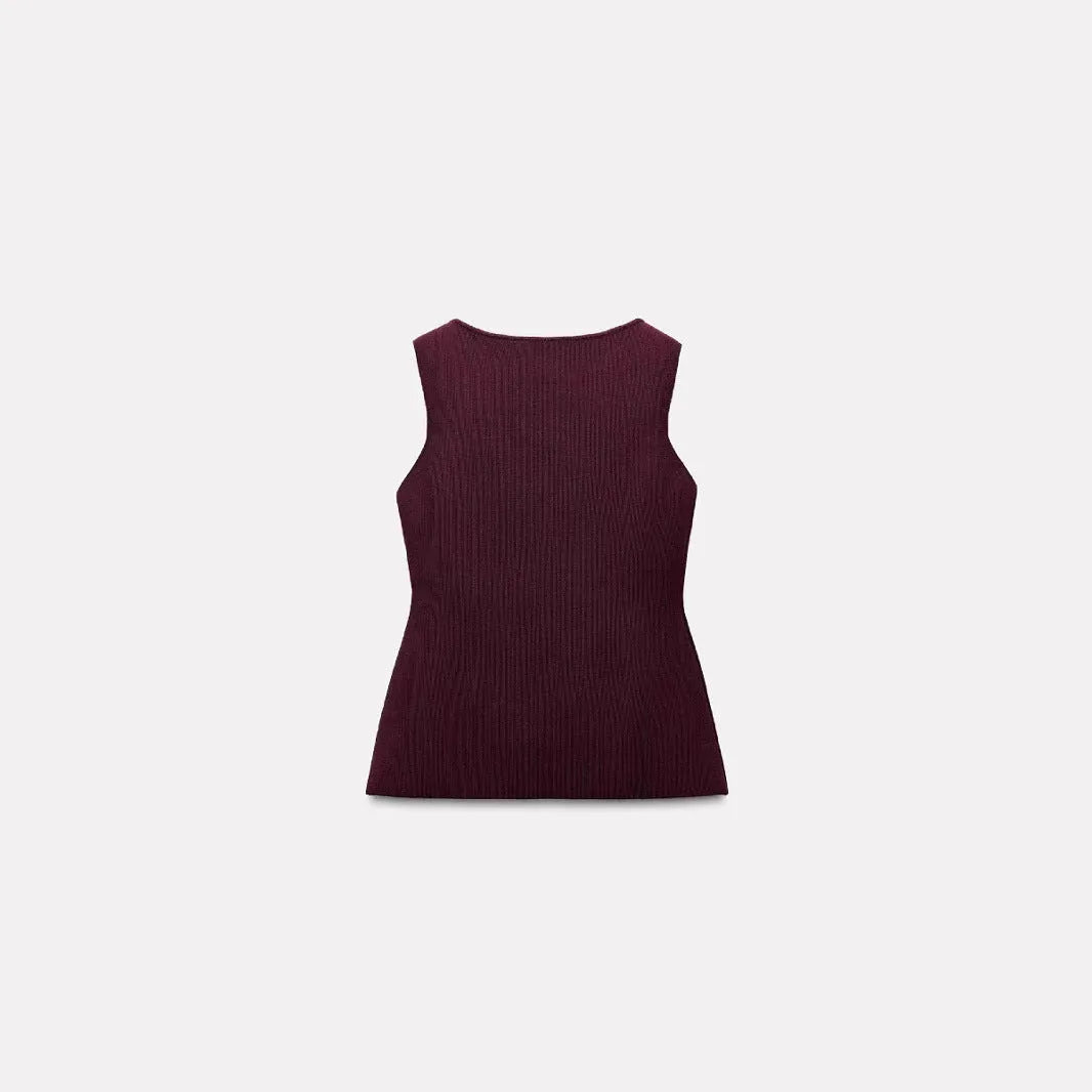 Women's dark red viscose knit sleeveless vest with gold buttons, shown on a model.