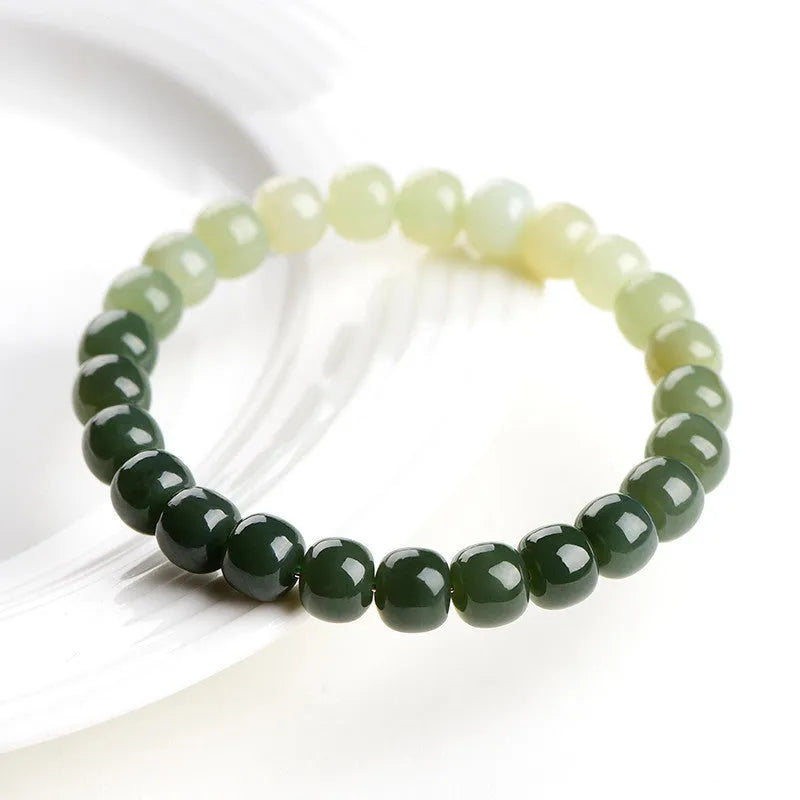 Hetian jade bracelet with sunny water gradient colour on wrist