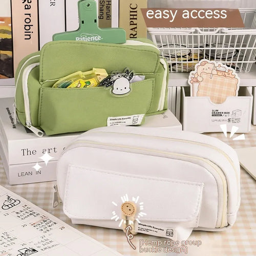 Green canvas button pencil case showing large capacity for pens in Korean style design.