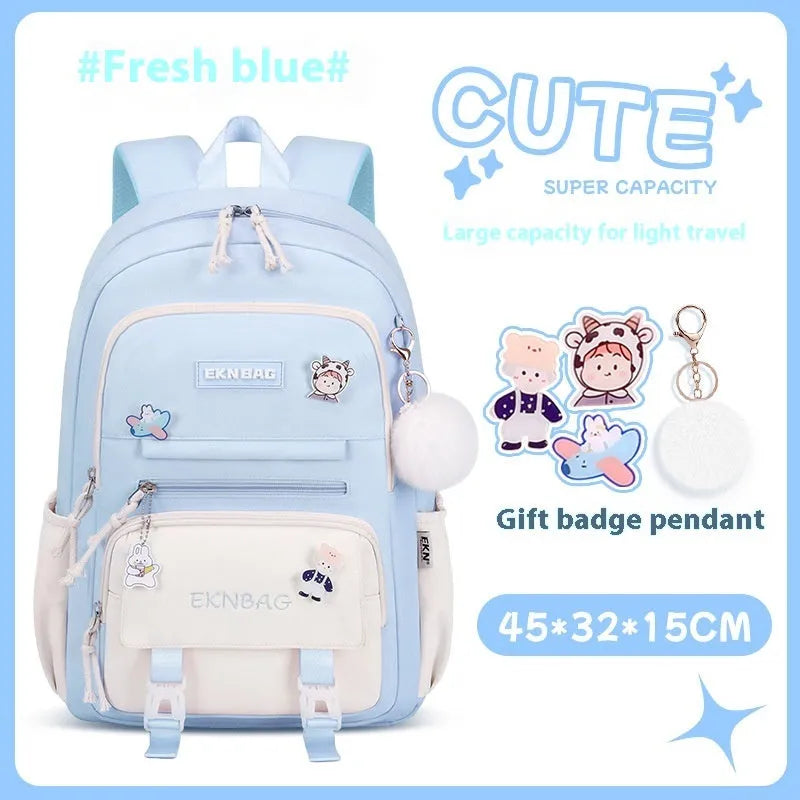 Pink waterproof Oxford cloth school backpack for girls with curved shoulder straps.