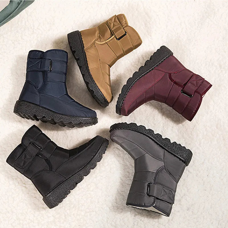 Women's waterproof snow boots with canvas upper, PU sole, buckle closure, and belt decoration