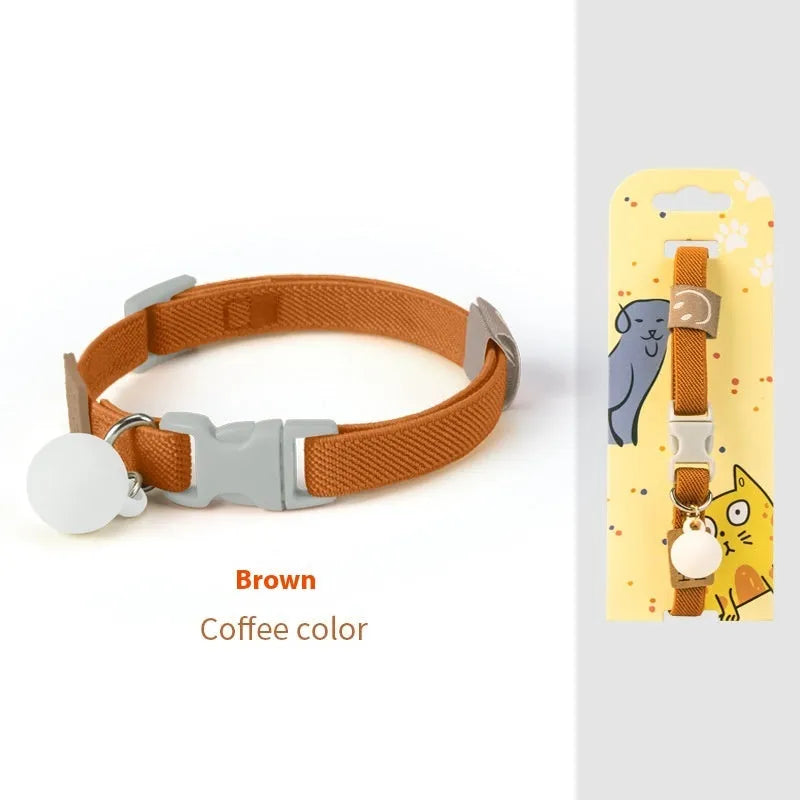 A stretchy yellow polyester dog collar for small breeds, shown adjusted to fit, with a metal D-ring.