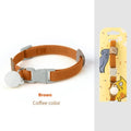 A stretchy yellow polyester dog collar for small breeds, shown adjusted to fit, with a metal D-ring.