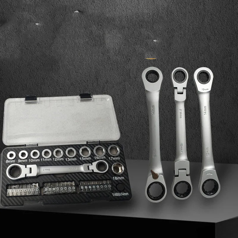 Ratchet wrench set with sockets and bit heads on grey background