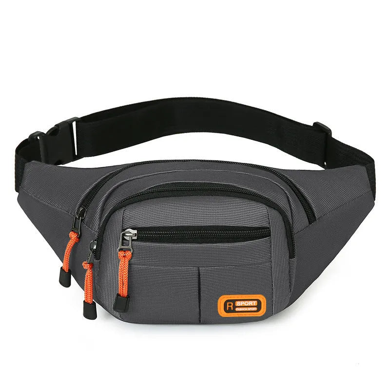 Large black waterproof slanted chest bag made of nylon, showing its front compartment and adjustable strap.
