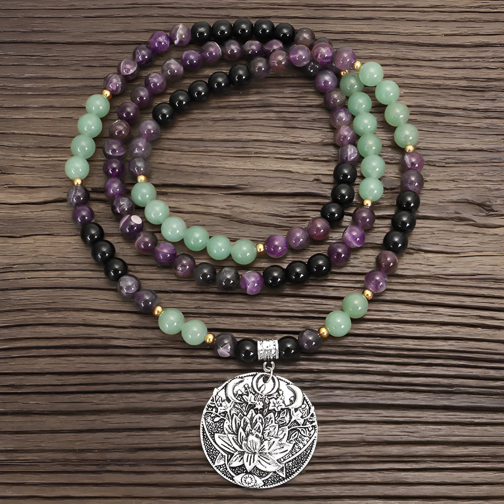 Dongling long necklace with geometric lotus pendant and adjustable cord alongside matching bracelet