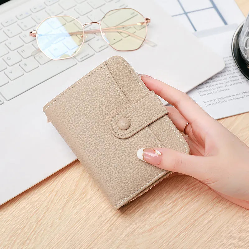 Ladies' short wallet with lychee pattern in beige, pink, black, or red colours