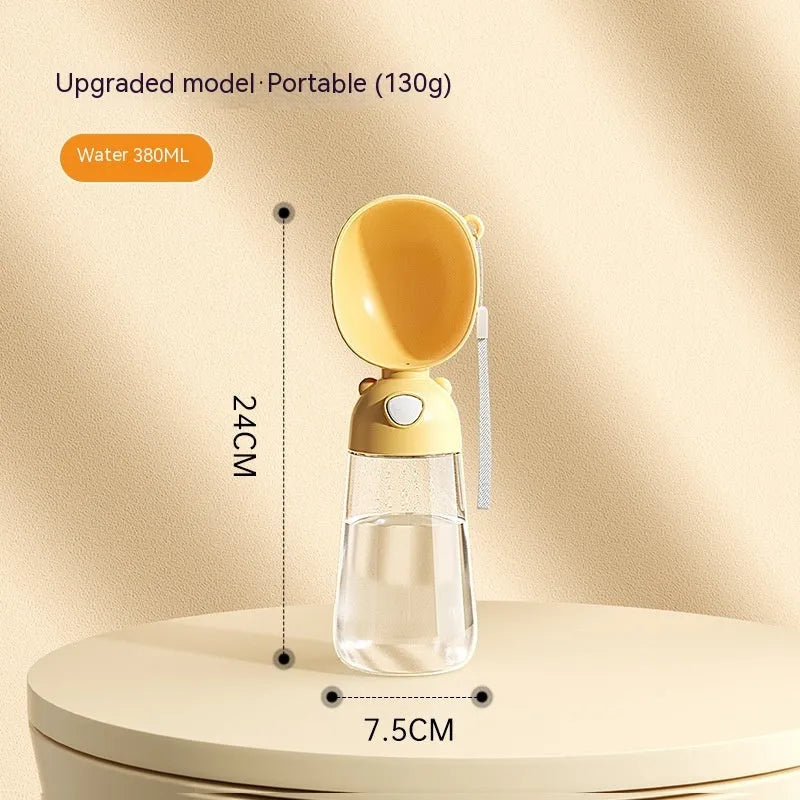 Portable dog water bottle and food container in yellow, pink, and brown for outdoor travel