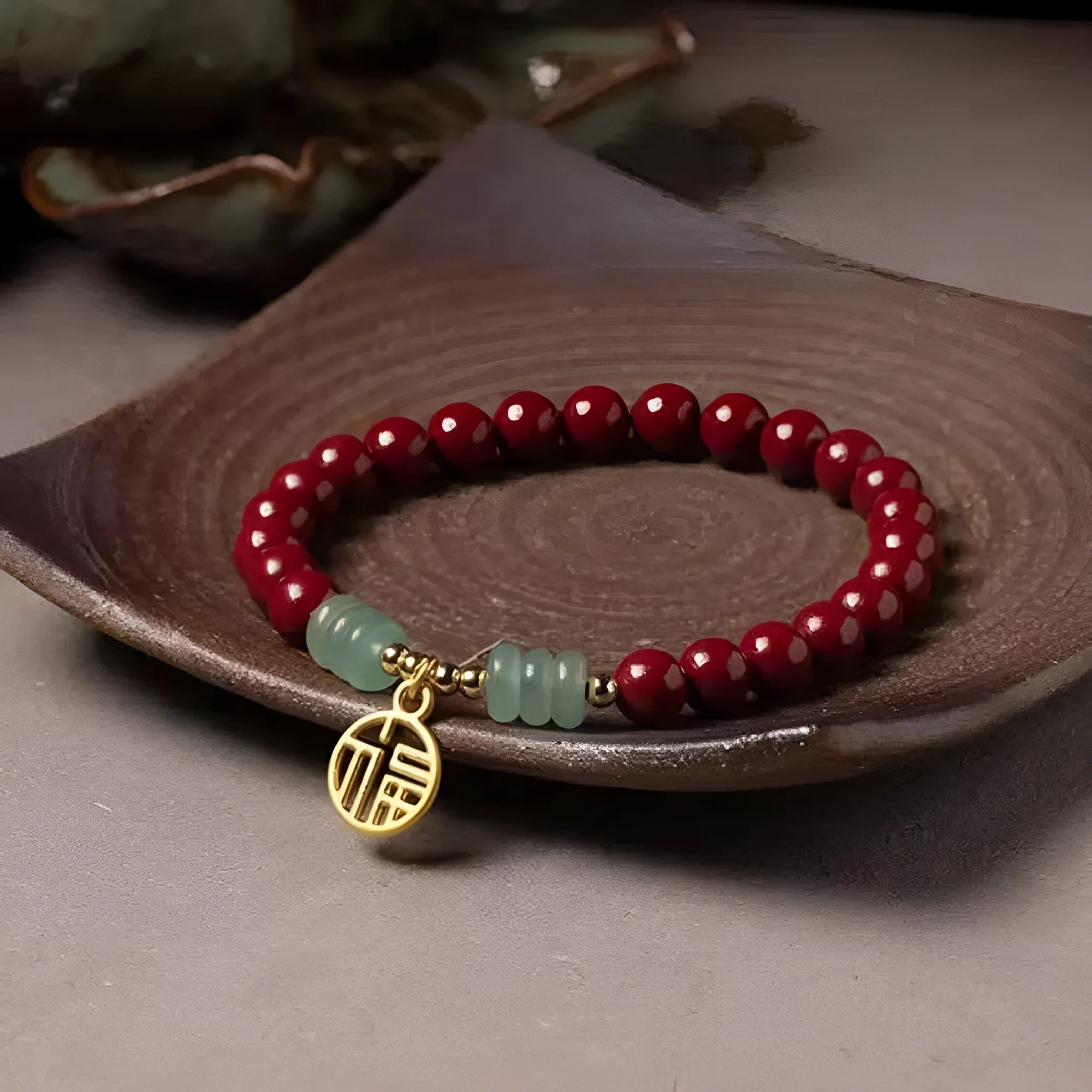 Handmade gold cinnabar wave bracelet showing genuine stone and copper bead construction in national style design