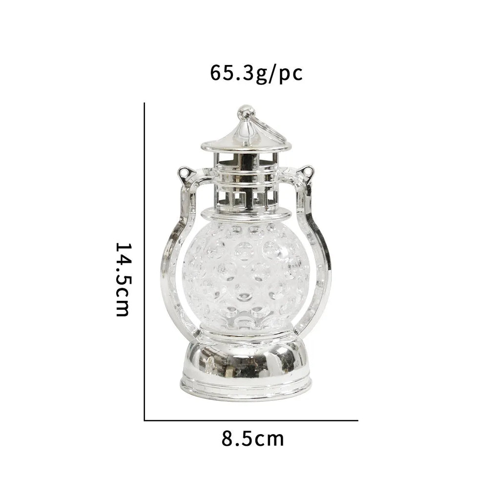 Retro oil lamp style LED night light in gold or silver finish measuring 14.5cm tall