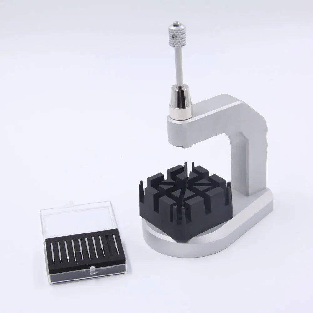 Silver-coloured tool steel press strap removal tool for watches and jewellery with metric blade.